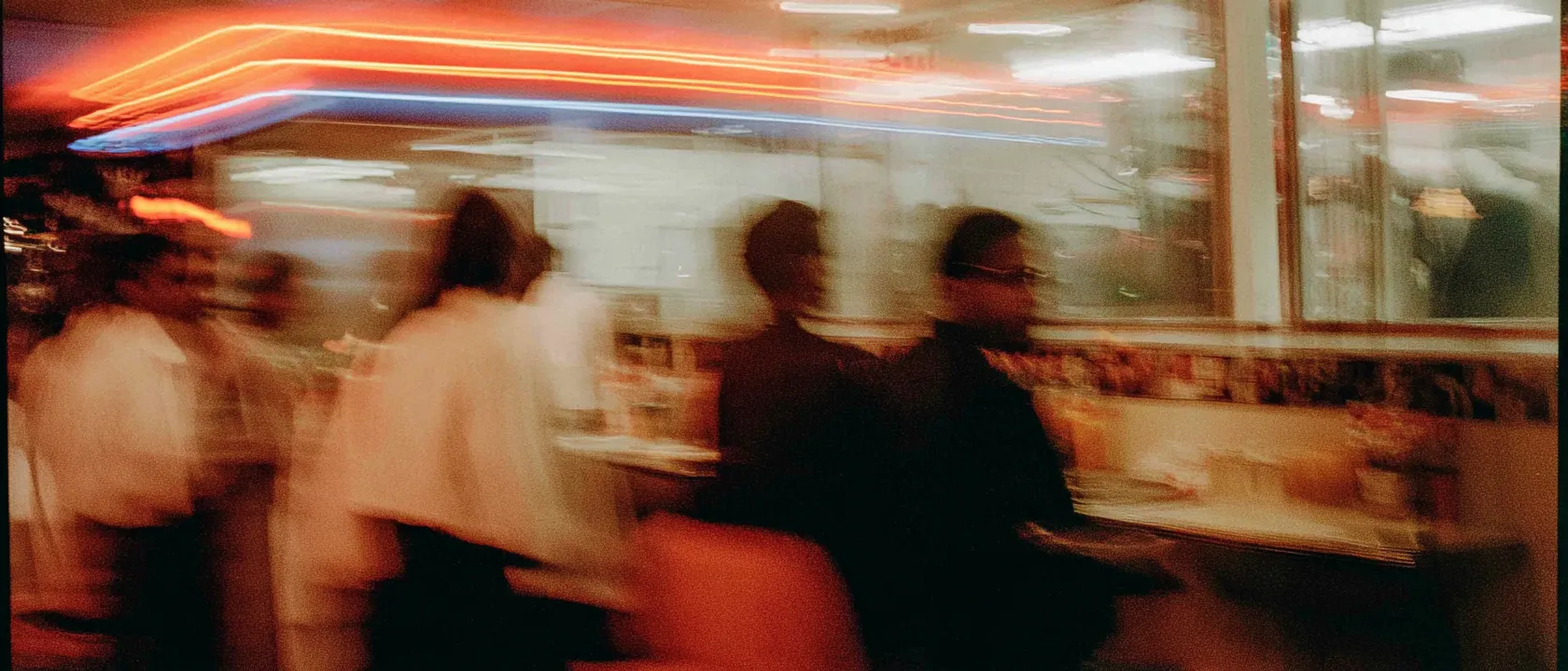 Busy restaurant dining room with customers